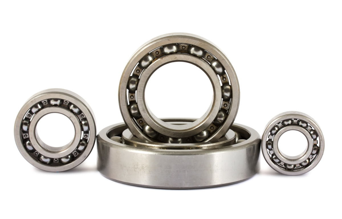 Four ball bearings isolated on white background